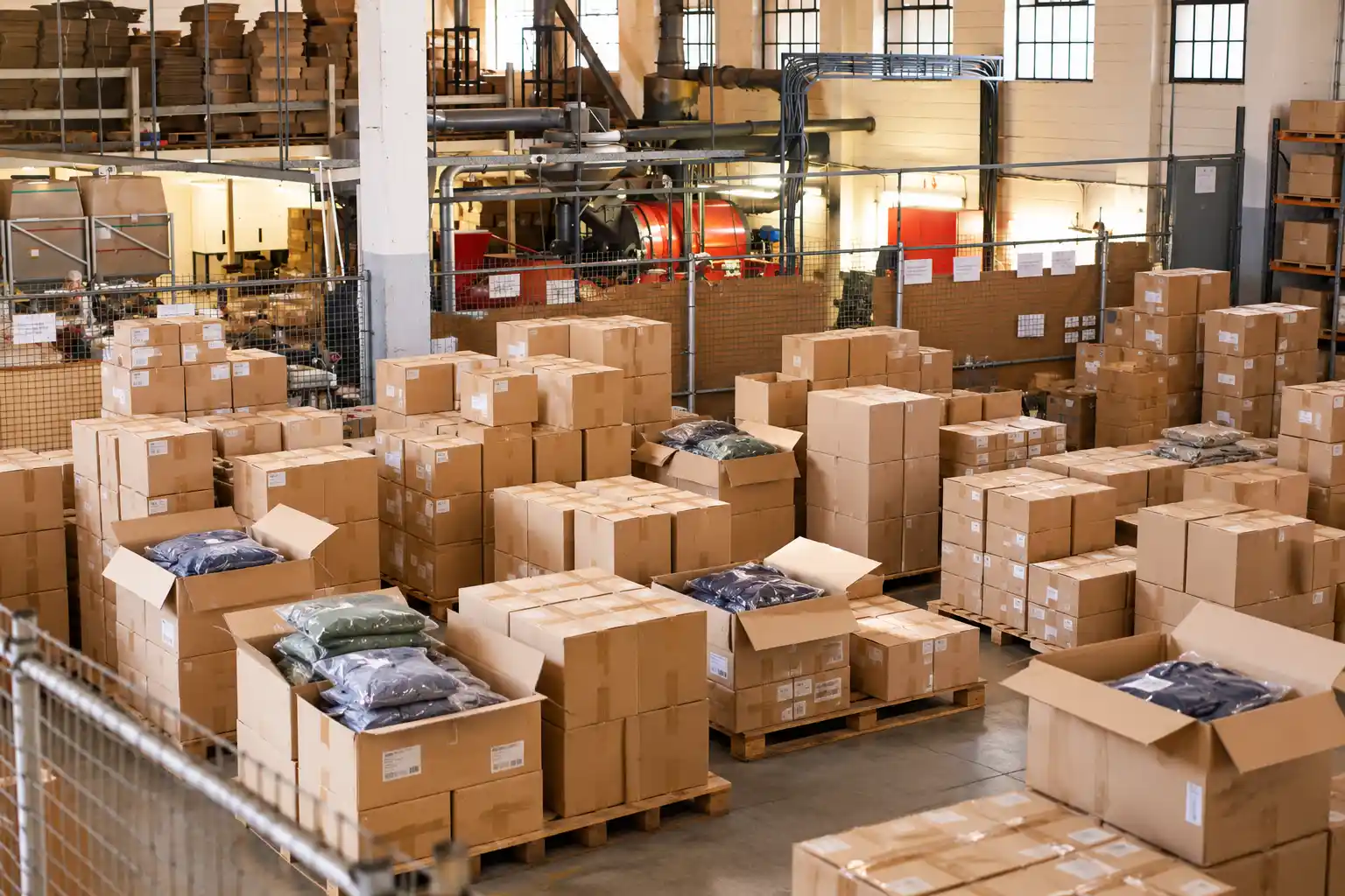 Packed garment cartons in a warehouse in India, ready for export to European brands